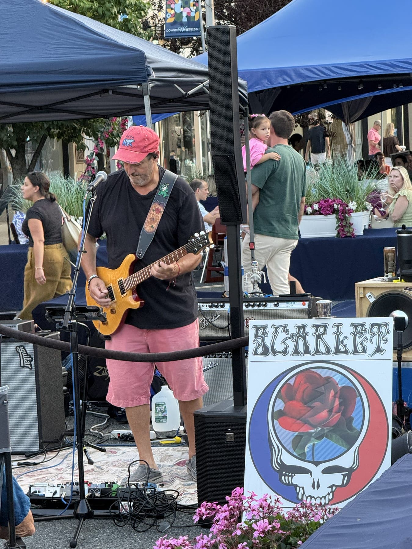 A Scarlet Magnolia guitarist performs during the Grateful Dead tribute night in downtown Westfield.